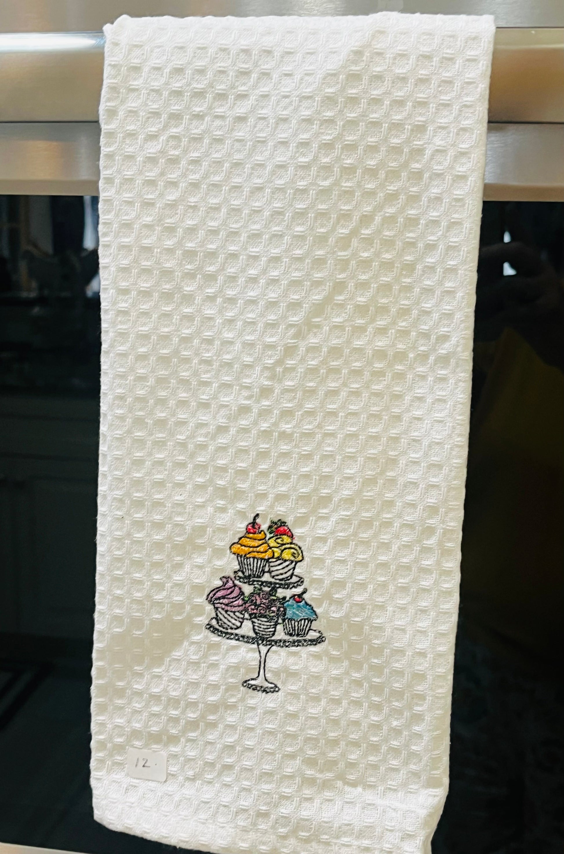 Embroidered cupcake stand kitchen towel
