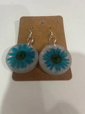 White mica resin earrings and blue pressed flowers.