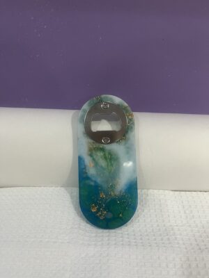Green, white and gold bottle opener